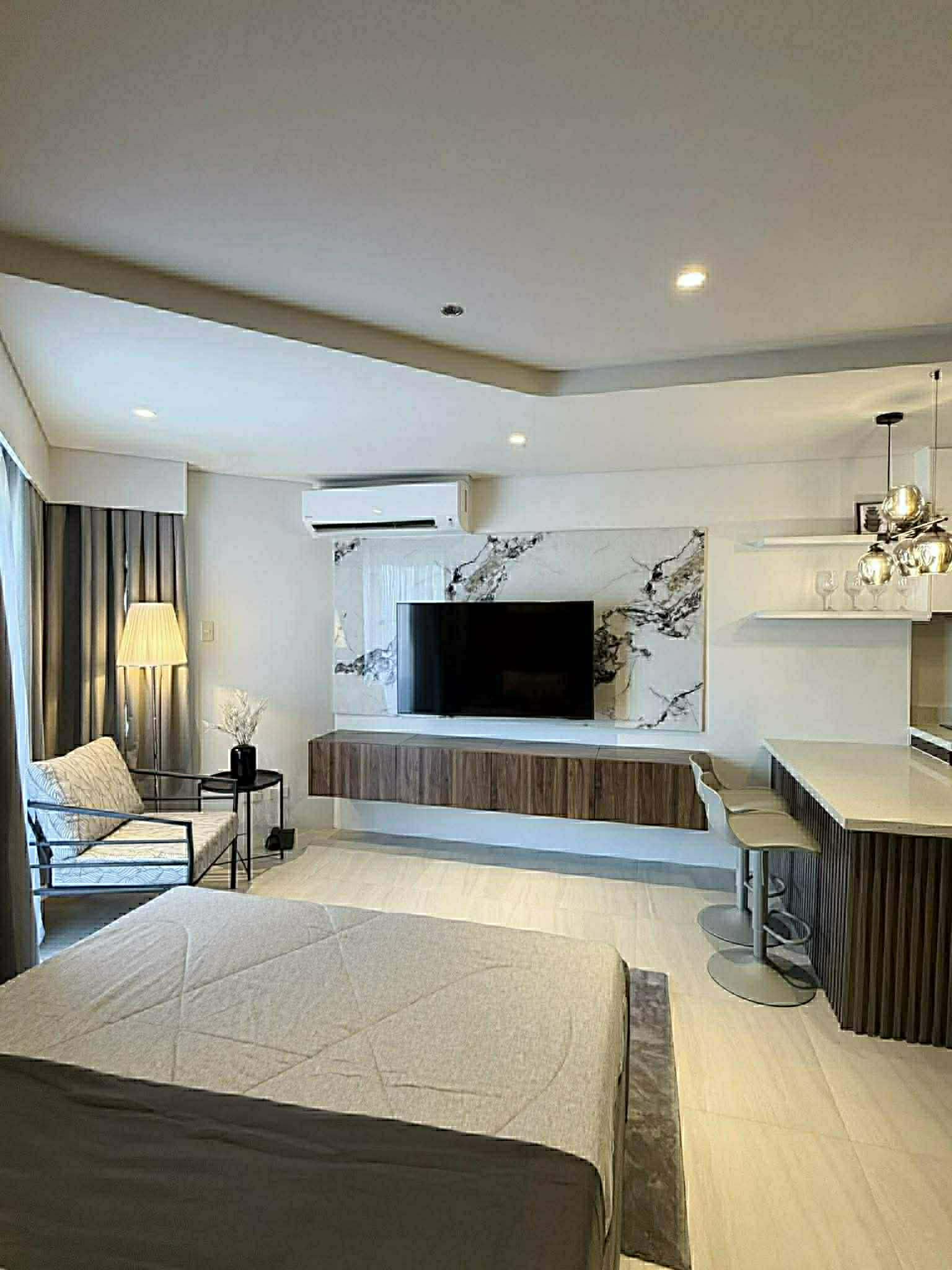 Luxury Fully Furnished Studio for Rent at Tambuli Seaside Resort & Spa | 16th Floor | 36.5 SQM | WiFi & Parking Included https://www.rent.ph/uploads/0016/16244/2026/03/03/2.jpg
